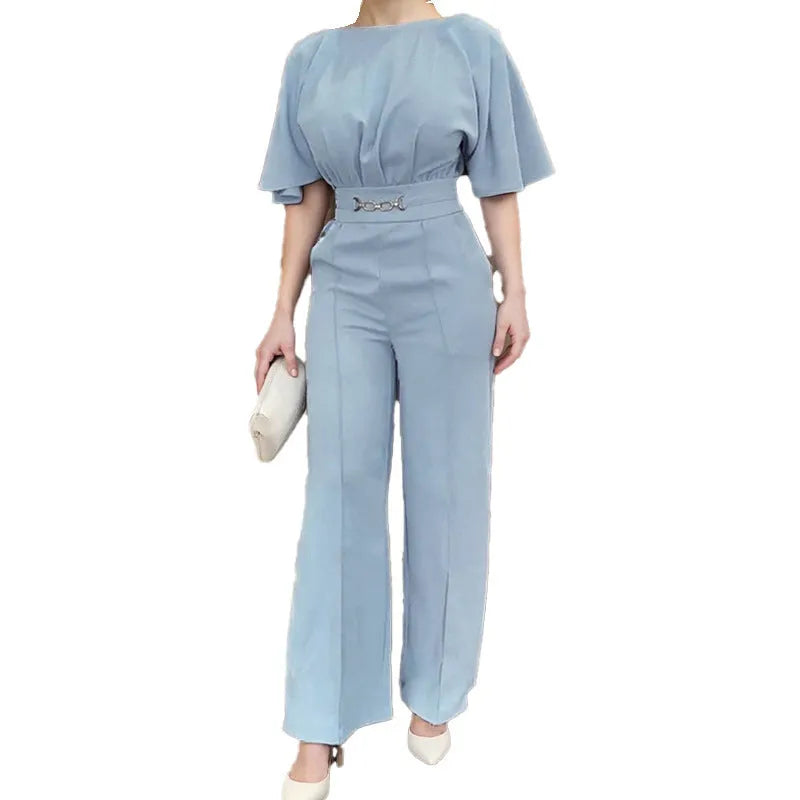 Blue polyester men's two-piece suit with long-sleeved jacket and trousers on hanger