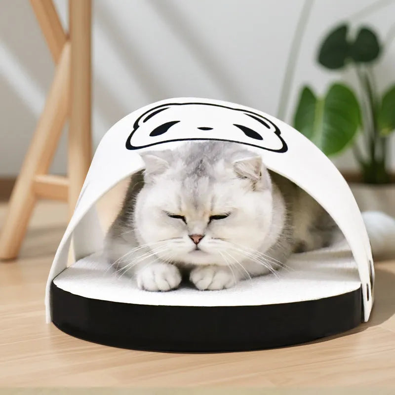 White slipper-style corrugated paper cat scratch board on floor