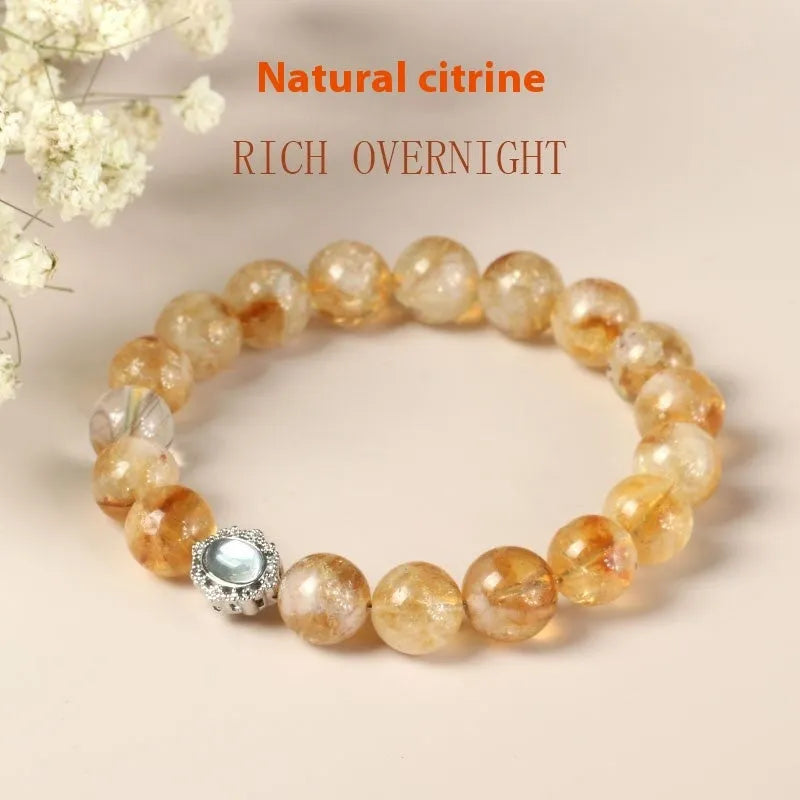Geometric citrine crystal bracelet with 10mm stones on a metal setting, unisex design.