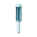 Blue pet hair remover roller with self-cleaning base on a fabric sofa.