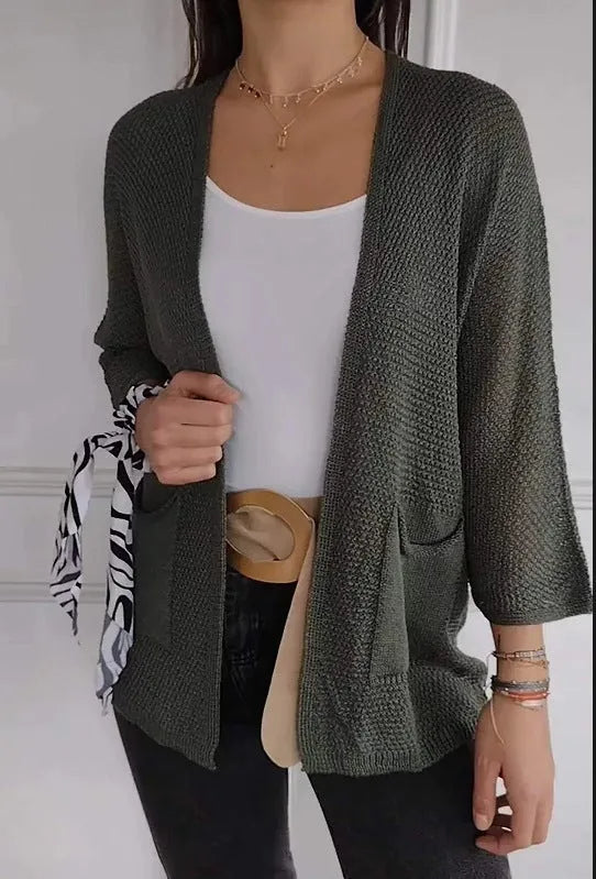 Women's thin waffle knit cardigan coat with nine-quarter sleeves and front pockets in army green.
