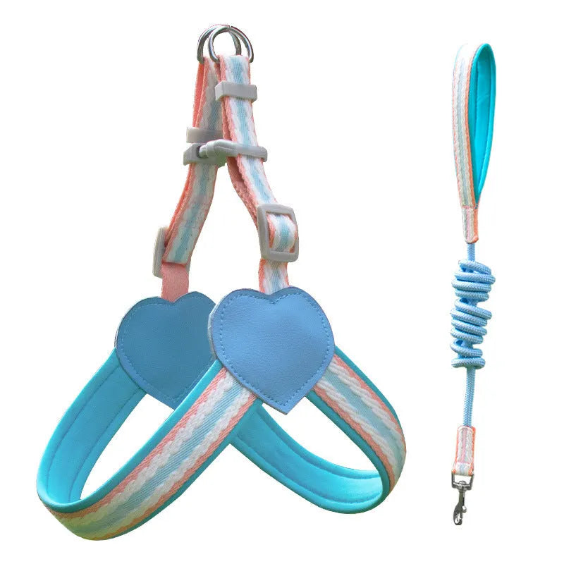 Nylon dog walking chest strap vest with an attached hand holding rope, shown in emerald green.