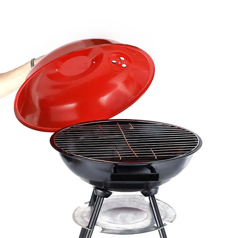 Portable 14-inch iron barbecue grill oven with apple stove design on a neutral background
