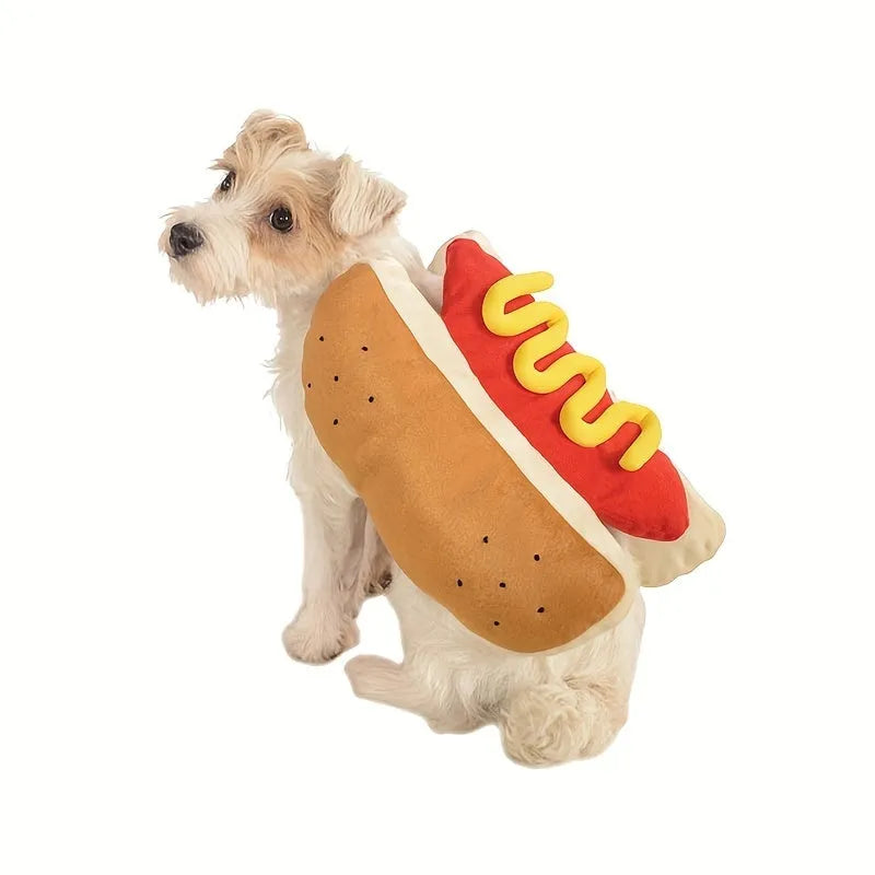 Small dog wearing a stuffed brown and beige hot dog costume with bun.