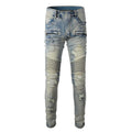 Light blue men's slim fit distressed jeans with hand-frayed details and a straight leg opening.