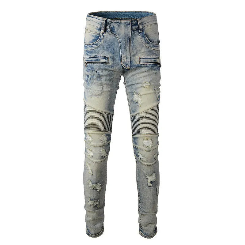 Light blue men's slim fit distressed jeans with hand-frayed details and a straight leg opening.