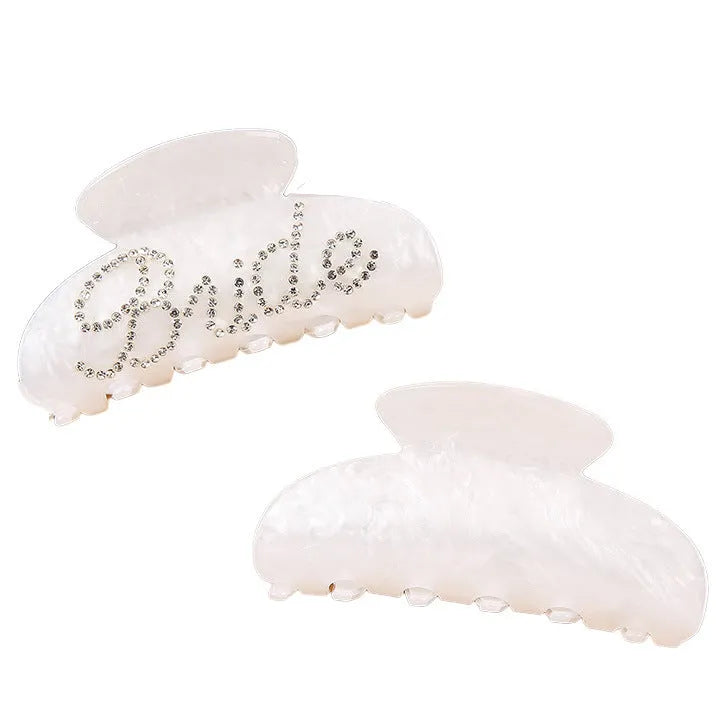 10cm long acrylic shower shark hair clip with diamond spot drill decoration in pink colour with back clip mechanism.