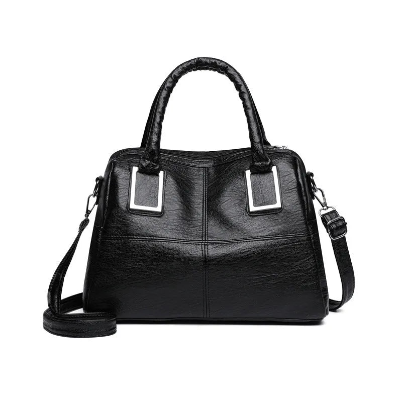 Women's square shoulder bag showing internal phone pocket and document compartment in neutral colour