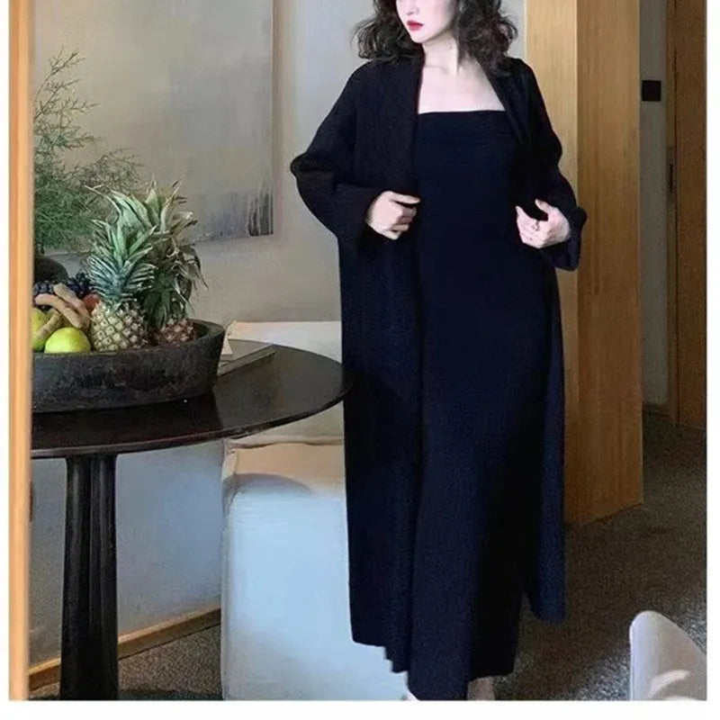 Women's grey knitted cardigan dress and coat suit set with flocking pattern detail.