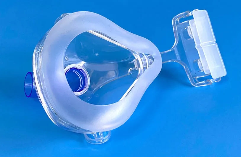 Transparent CPAP breathing mask with silicone construction and ventilator adapter accessories