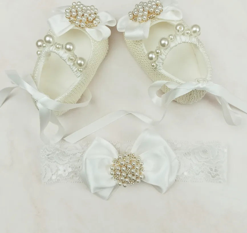 Milky white handmade soft sole cloth princess shoes with pearl detailing and lace-up closure for babies