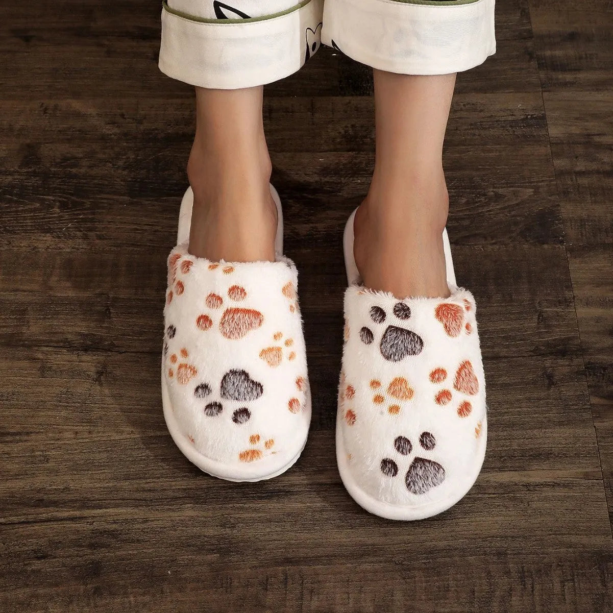 Women's cartoon print velvet cotton slippers in white with a toe holder design, shown on a plain background