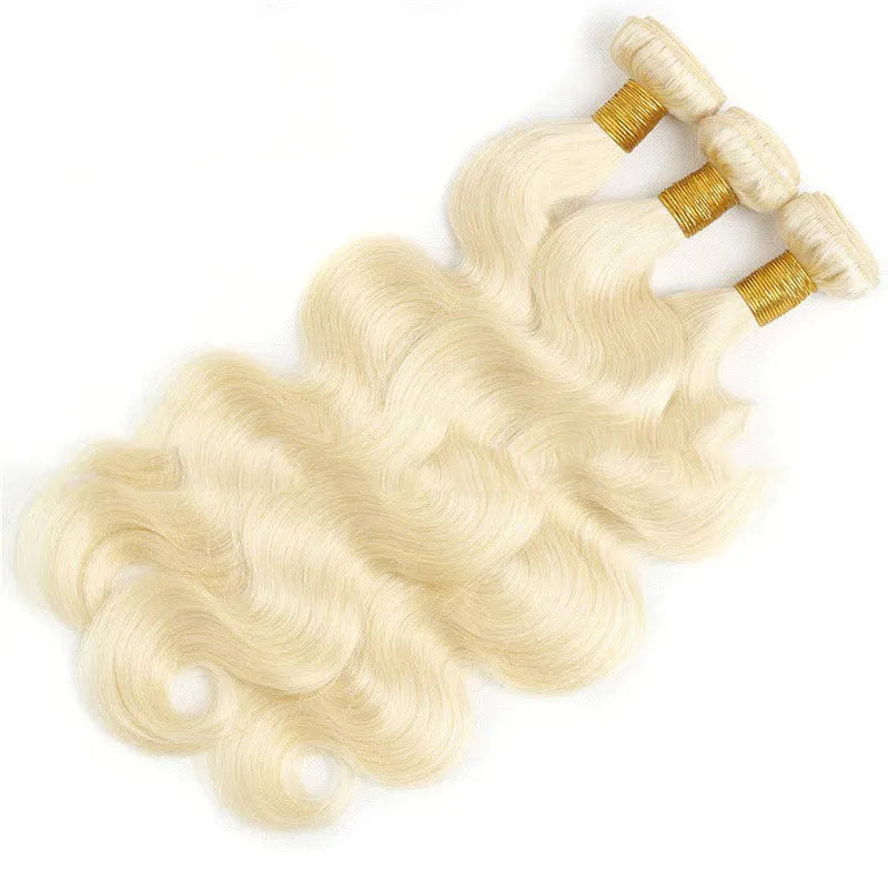 Light gold 613 body wave wig with snake wavy texture on a mannequin head showing 16-24 inch length options