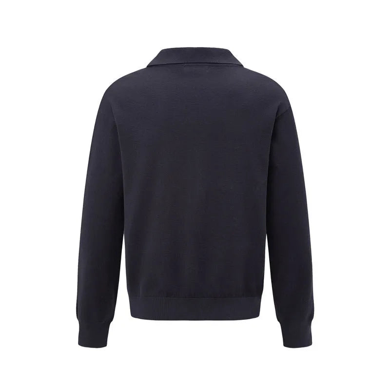 Man wearing a loose black chemical fibre blend pullover sweater for casual leisure