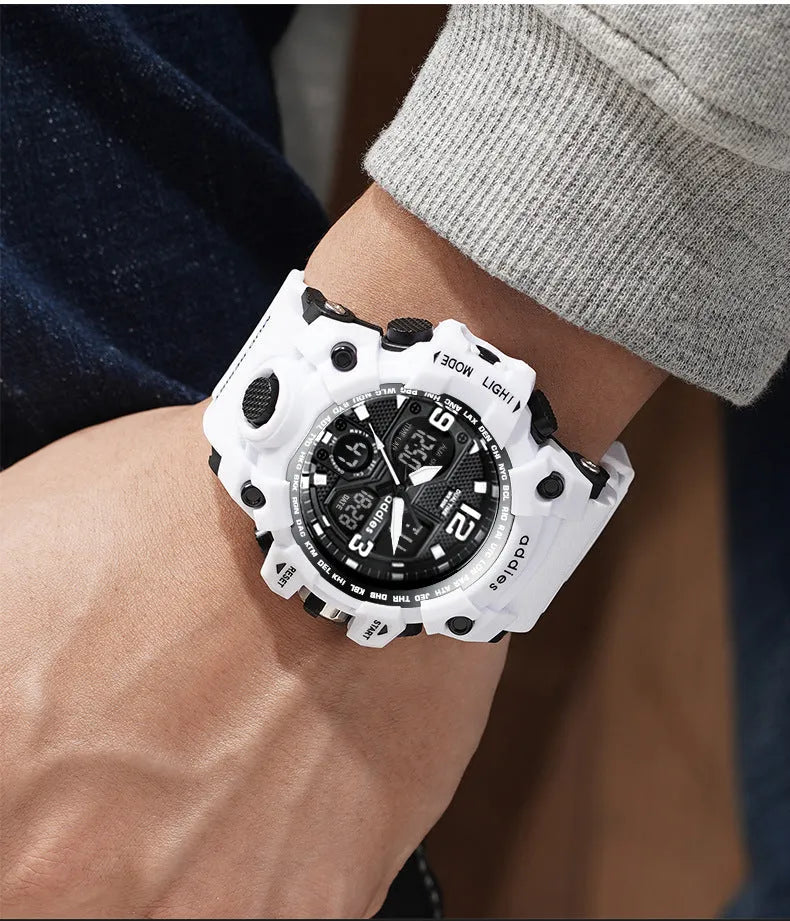 Electronic sports watch with dual analogue and digital display on plastic strap