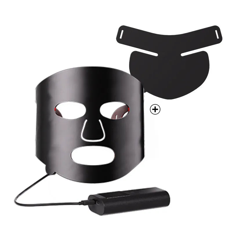 Black and gold LED phototherapy face mask with controller, shown with its USB charging cable.
