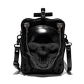 Black mini square messenger bag with embossed skull design, featuring stitching, rivets, chain details and zipper closure