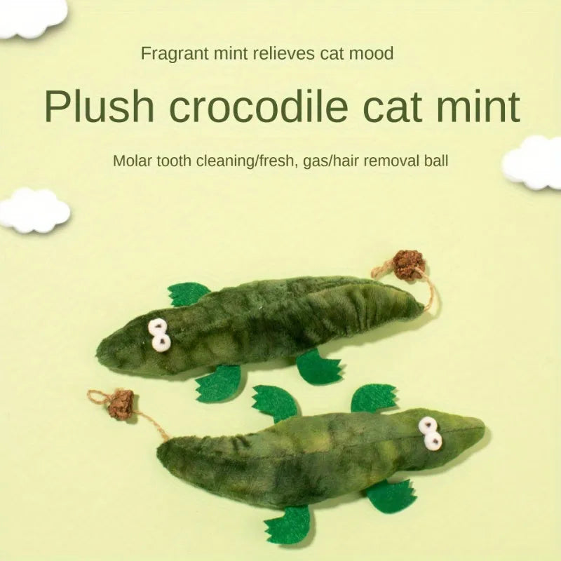Green plush alligator catnip toy with plant-based filling for feline oral cleansing and stress relief