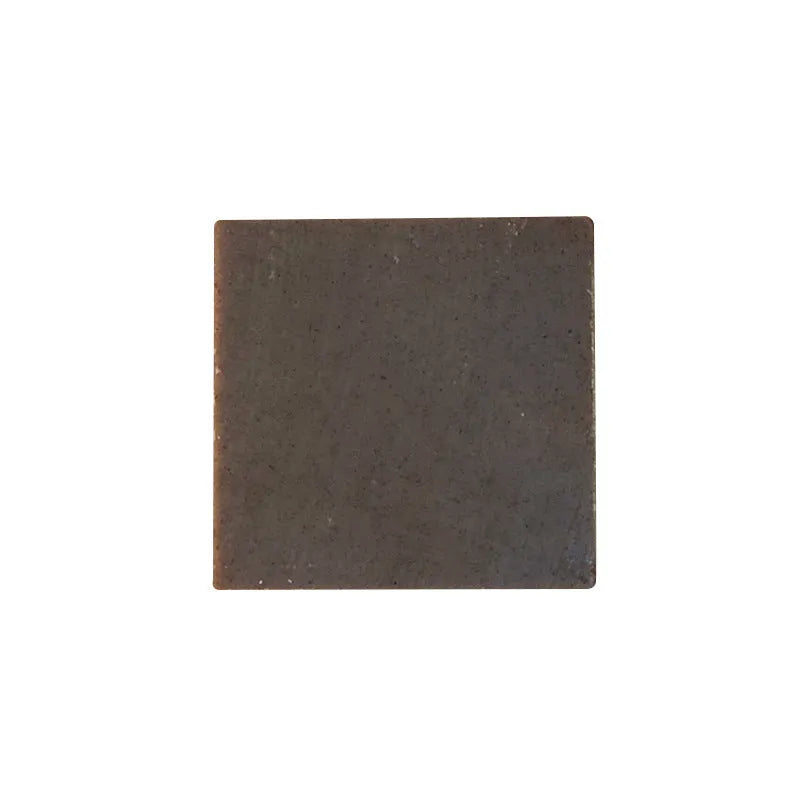 Single 72g bar of nine grass cold process shampoo soap on a white background.