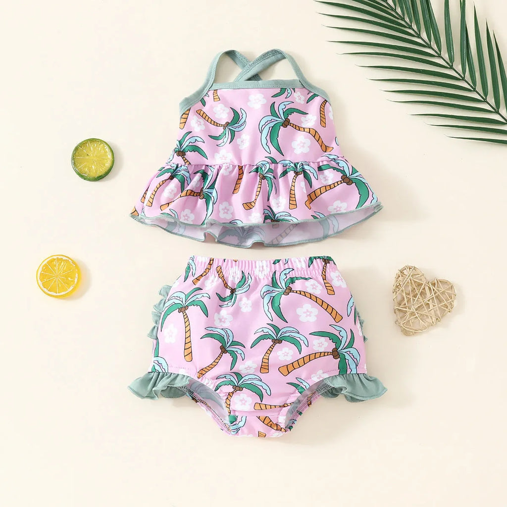 White children's two-piece swimsuit set with top and beach shorts on hanger