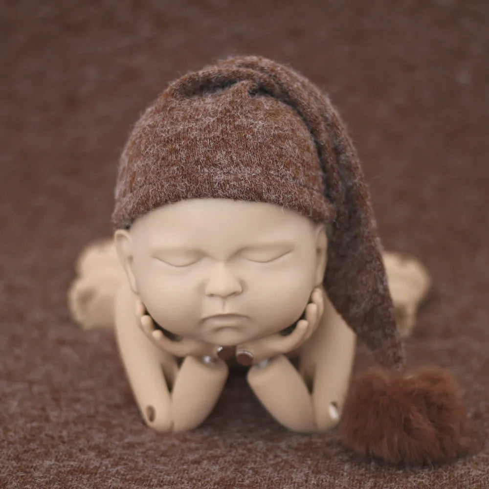 Hand-woven yarn baby photography hat in conical style, available in twelve colour options