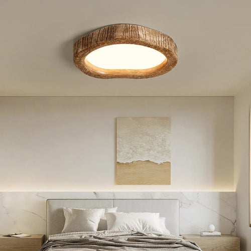 Round wood grain finish ceiling lamp in new Chinese style, flush mounted on a white ceiling.