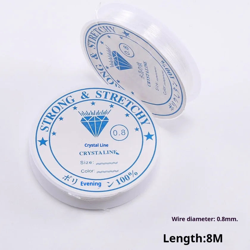 Clear white elastic fishing line on a reel for jewellery making and DIY crafts