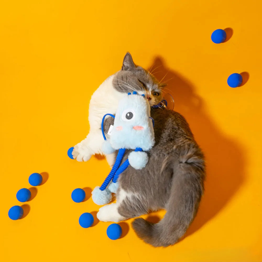 Blue plush ring cat toy with elastic rope and a mint-coloured bell, shown on a white background.