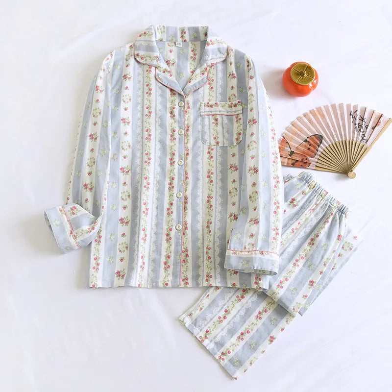 Ladies' cotton double-layer gauze homewear set with long sleeves and trousers in a striped or fruit print pattern.