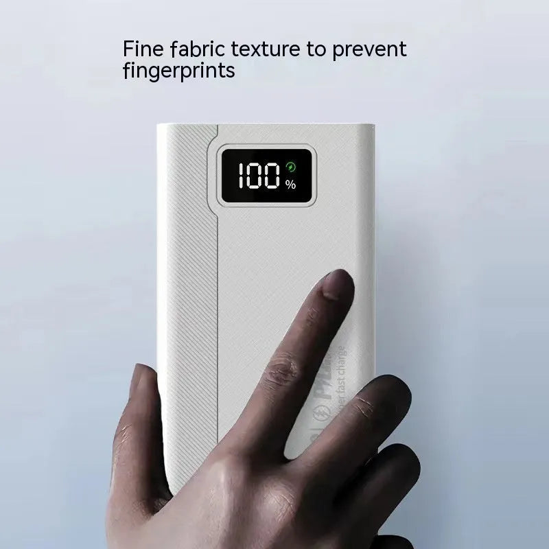 Large capacity power bank in black or white with plastic shell and multiple charging capacity options