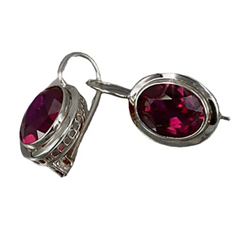 Women's minimalist earrings with red oval gemstone in geometric hollow design, silver electroplated alloy