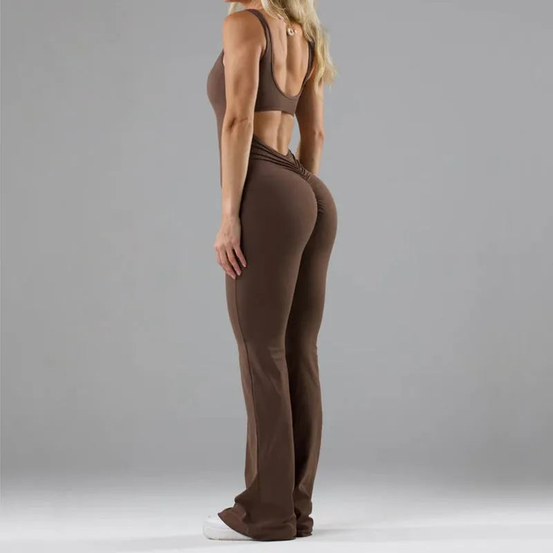 Women's black milk silk yoga bodysuit with hollow back and seamless construction on a mannequin.