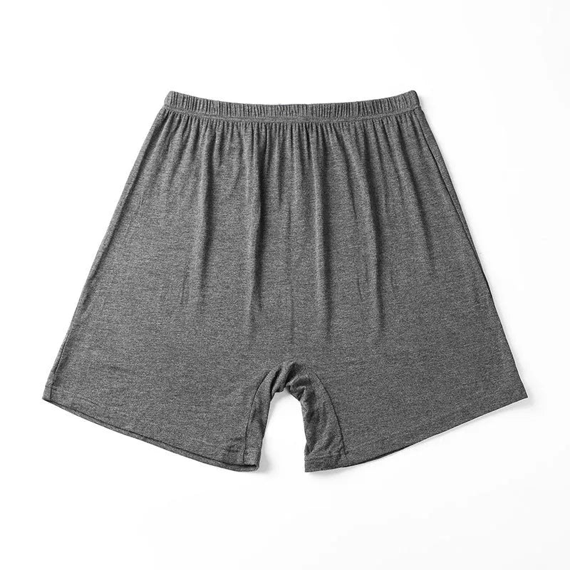 Men's solid colour modal boxer shorts with high waist in black, displayed flat.