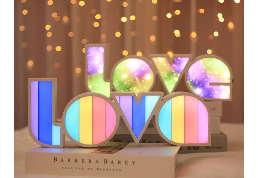 Colourful LED love light decorative lamp with plastic shell on a table