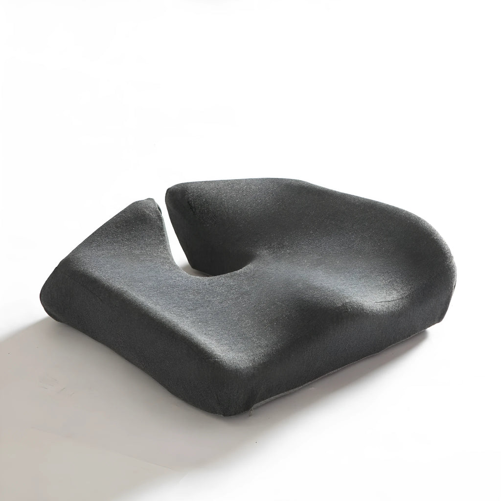 Memory foam office seat cushion in grey on a chair, showing its 36x40cm rectangular shape.