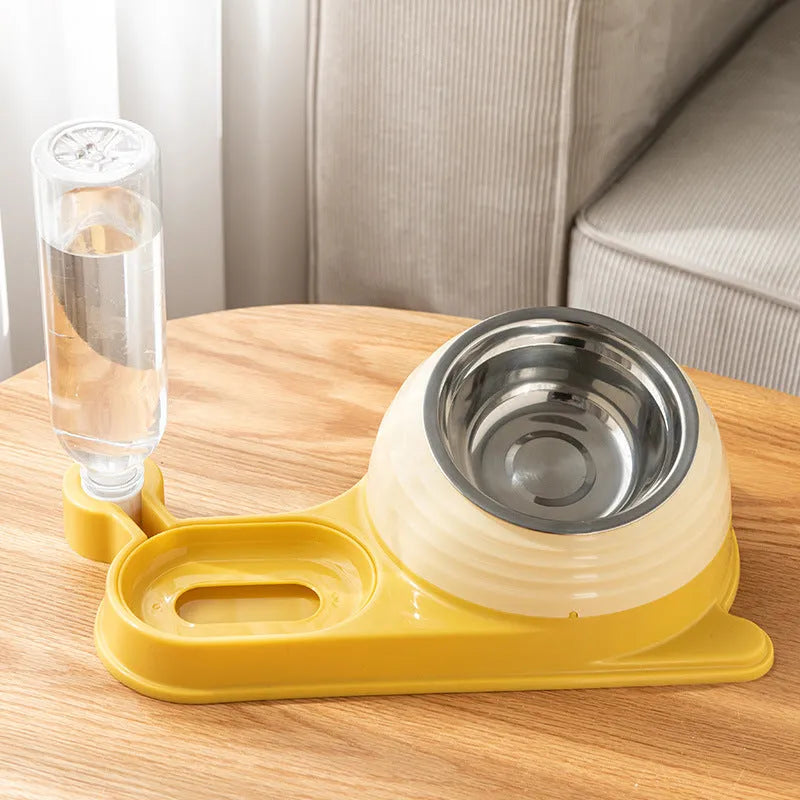 Brown elevated cat food bowl with attached water bottle dispenser on a floor.