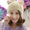 Hand-knitted wool beanie with 3D cat ears in multiple colour options