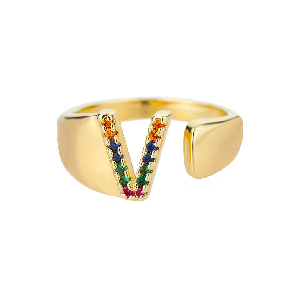 Fashion micro-set colored zirconium adjustable open ring showing letter A on a copper electroplated base