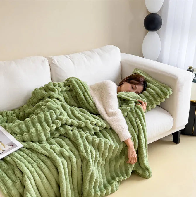 Soft Wind bubble velvet faux rabbit fur blanket in a solid colour, showing its double-sided texture.