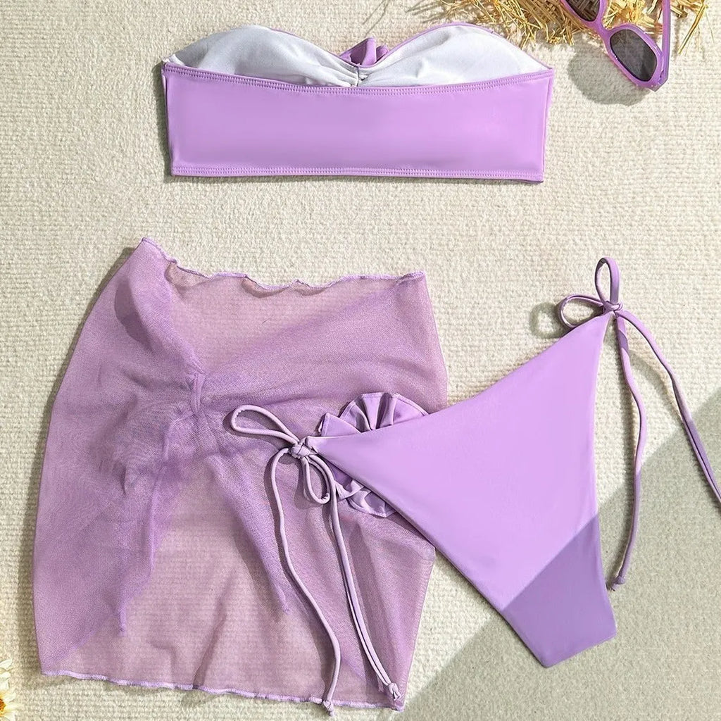 Women's pink floral tube top swimsuit set with matching skirt on mannequin