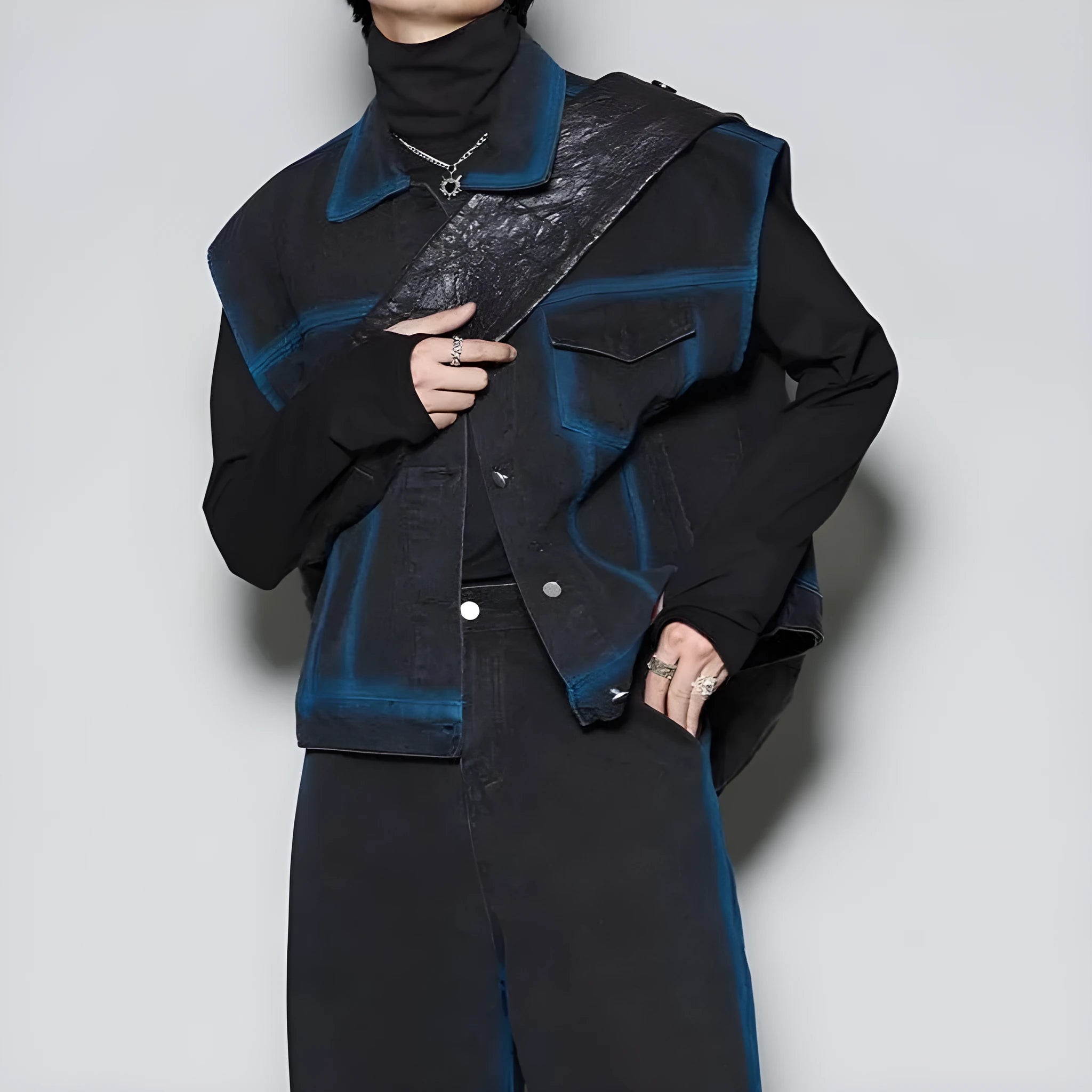 Blue distressed vest and jeans two-piece suit set with spray colour gradient on fleece-lined polyester.