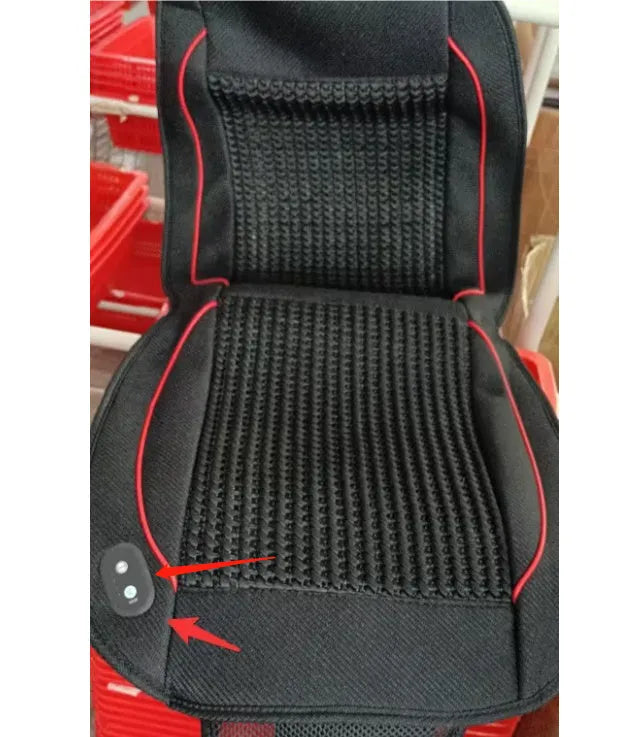 Square black car seat ventilation cushion with power cord, shown on a car seat.