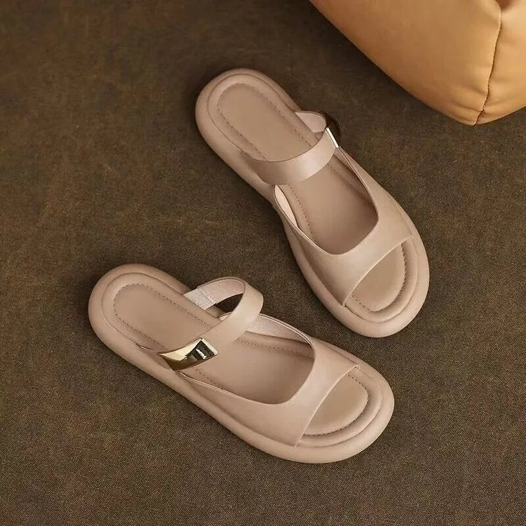 Apricot leather peep toe platform sandals with rubber sole showing open-toe design