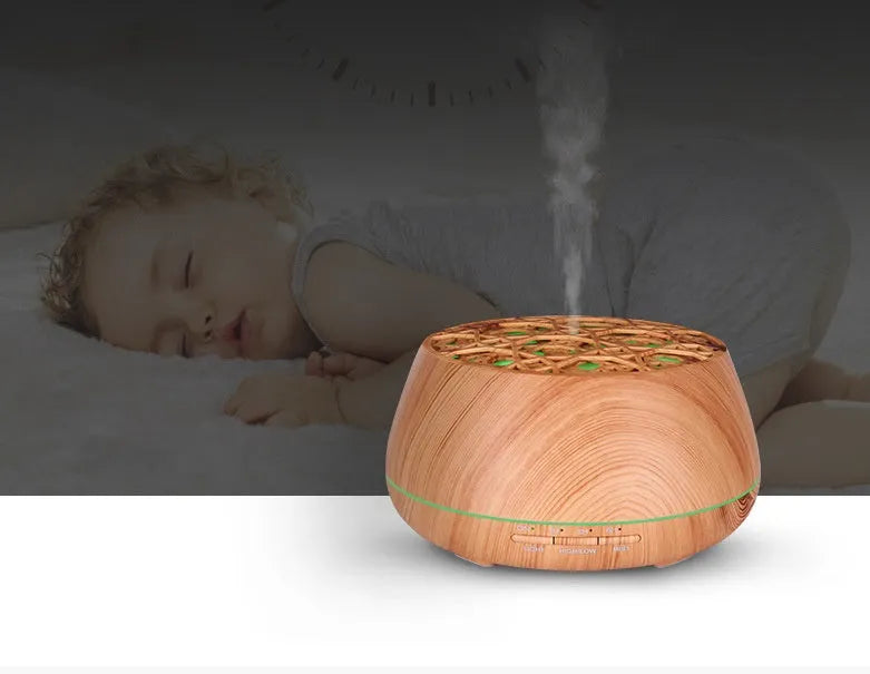 Medium 178x97mm ultrasonic aroma diffuser with four-hole mist output, 400ml capacity, dark wood grain finish, timer controls