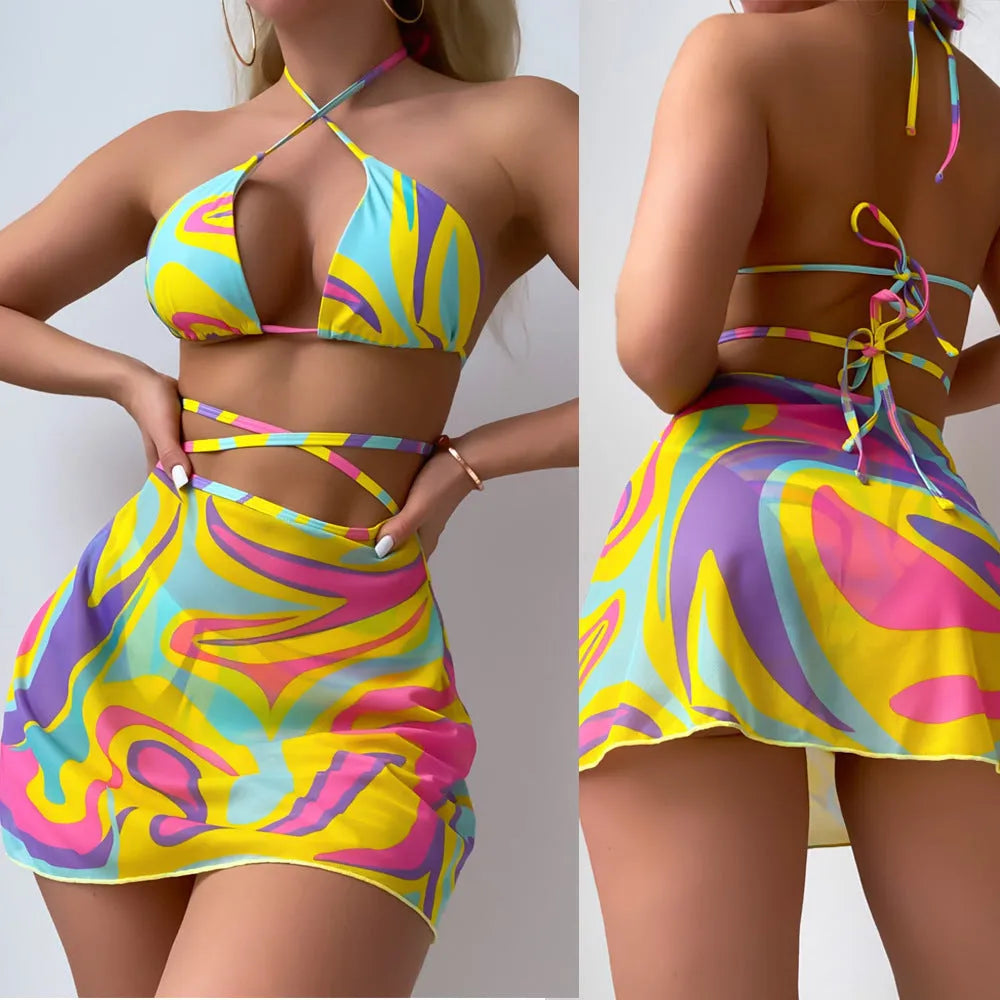 Yellow striped halter-neck swimsuit set for women with lace-up front, includes skirt and shorts