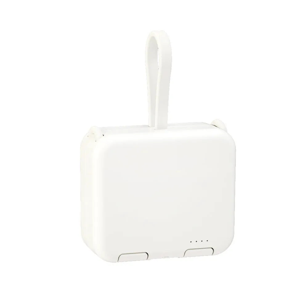 Handbag back clip power bank in blue, showing clip detail and phone standing in its holder mode.