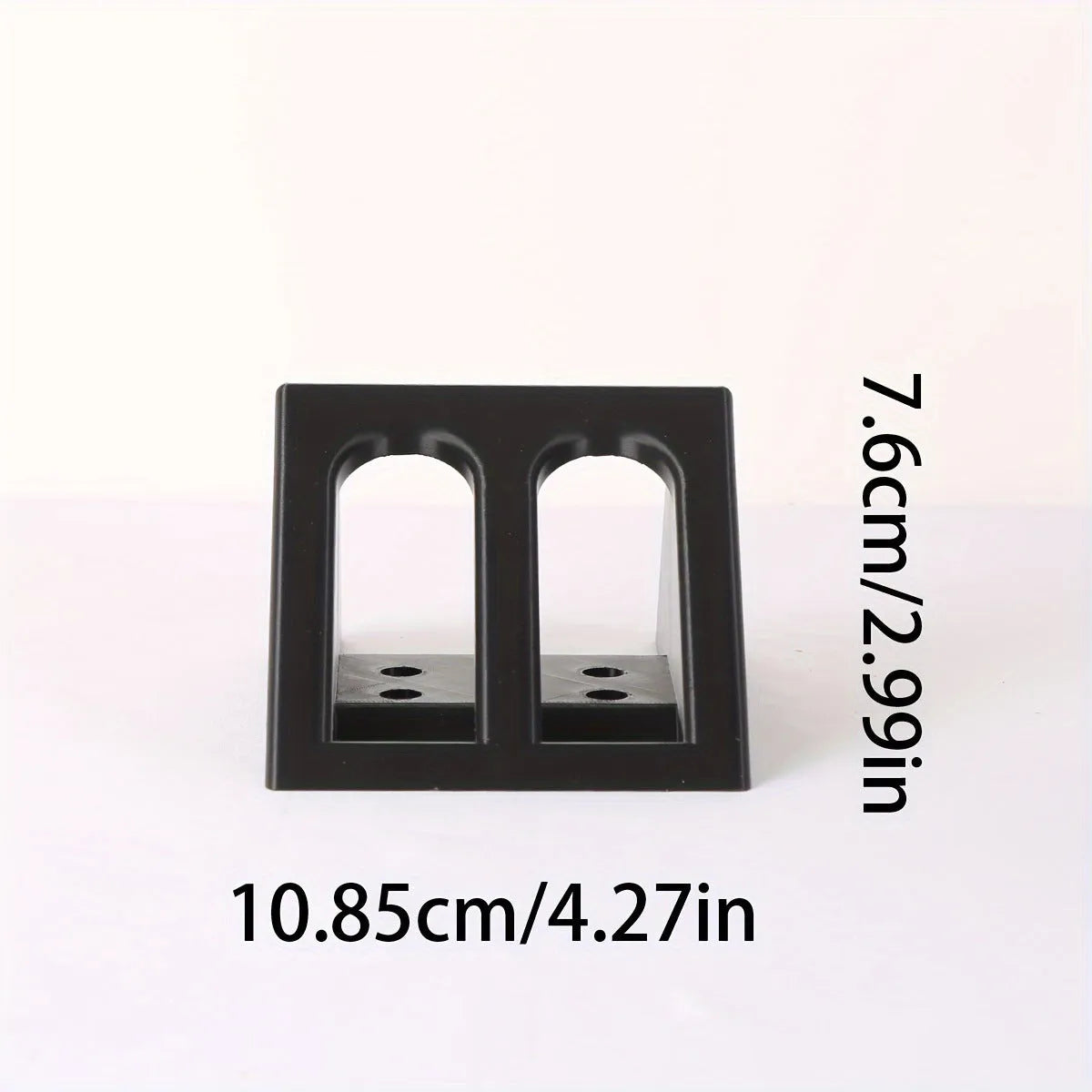 Black punk-style plastic pistol stand for firearm display