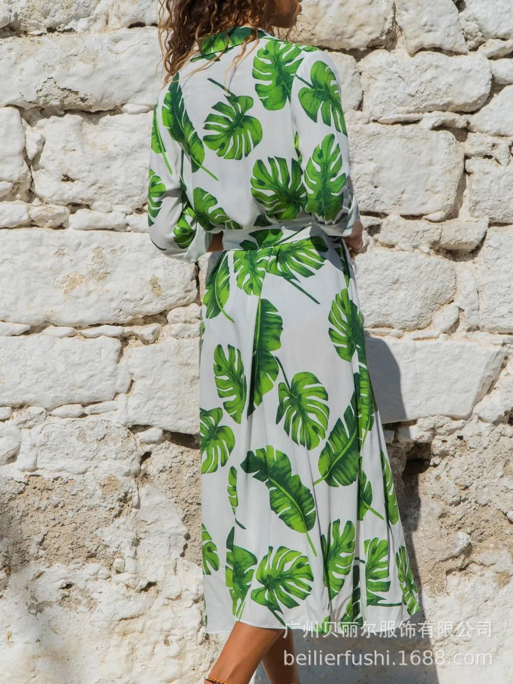 Women's long sleeve V-neck chiffon dress with A-line skirt and printed pattern.