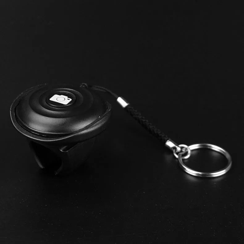 Black Bluetooth selfie remote control for smartphones with snap shutter button