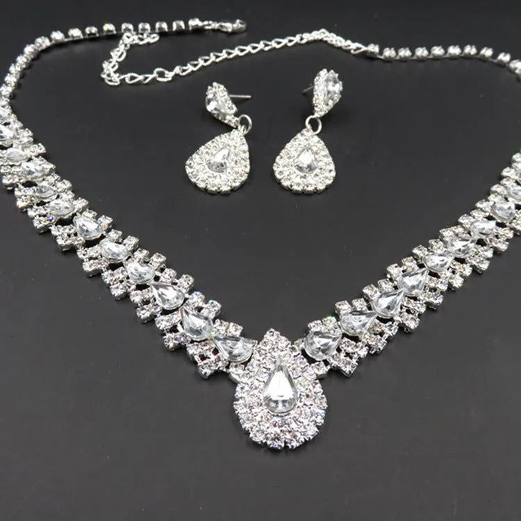 Bride wedding accessories earrings set with drop necklace on display